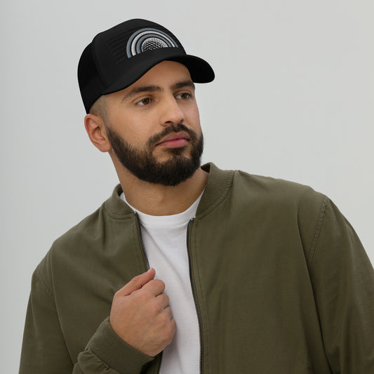 Male Model wearing Moon Ball Stealth Black golf casual Trucker Cap styled with golf streetwear outfit for everyday and on-course wear by fourteefore. Casual everyday golf streetwear cap by fourteefore for on and off the course