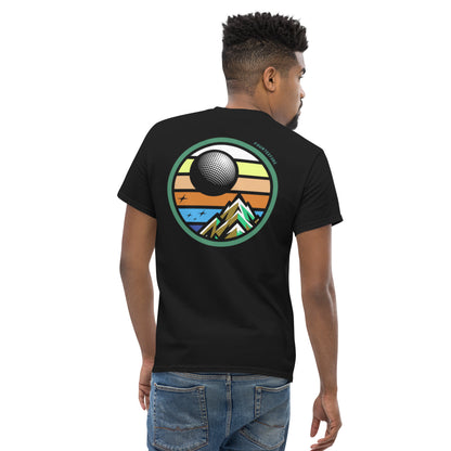 Male model wearing a Black twilight golf Fourteefore casual everyday golf streetwear cotton t-shirt with a bold colorful graphic of a mountain, moon and stars at dusk on the back with a small FTF logo embroidered on the left chest