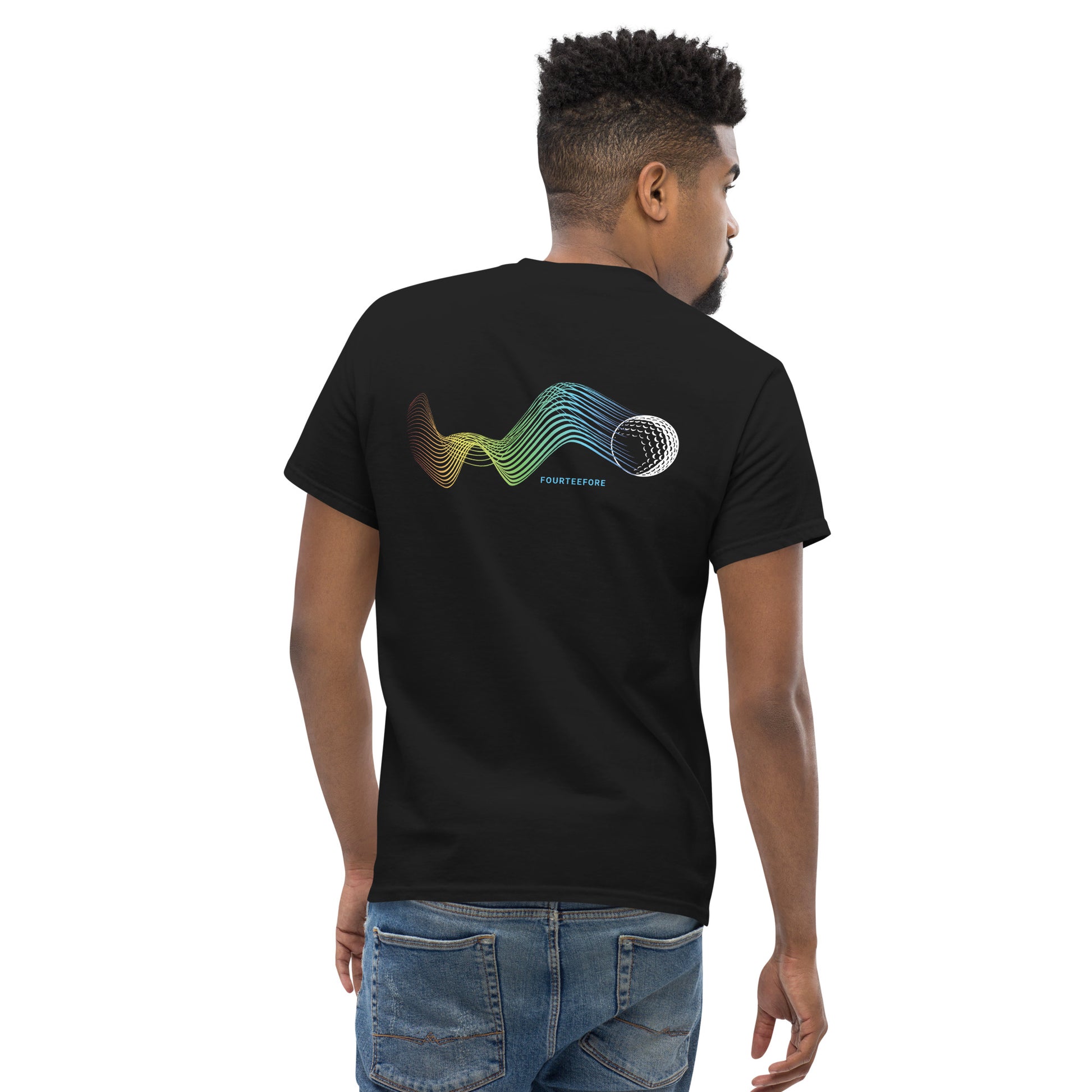 Male model wearing a Black bump n run Fourteefore casual golf t-shirt with a bold colorful graphic design of a golf ball as is bumps and runs.  small FTF logo embroidered on the left chest. Casual everyday golf streetwear by fourteefore