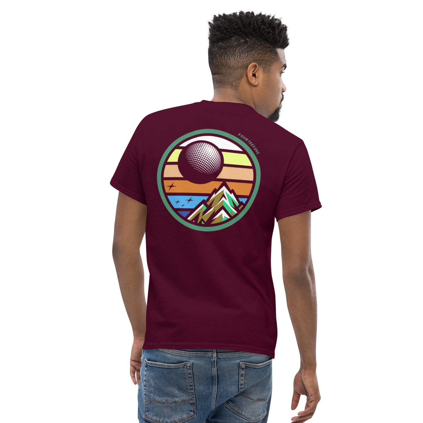 Male model wearing a maroon casual streetwear golf t-shirt with a colorful graphic on the back, standing against a white background. Casual everyday golf streetwear by fourteefore
