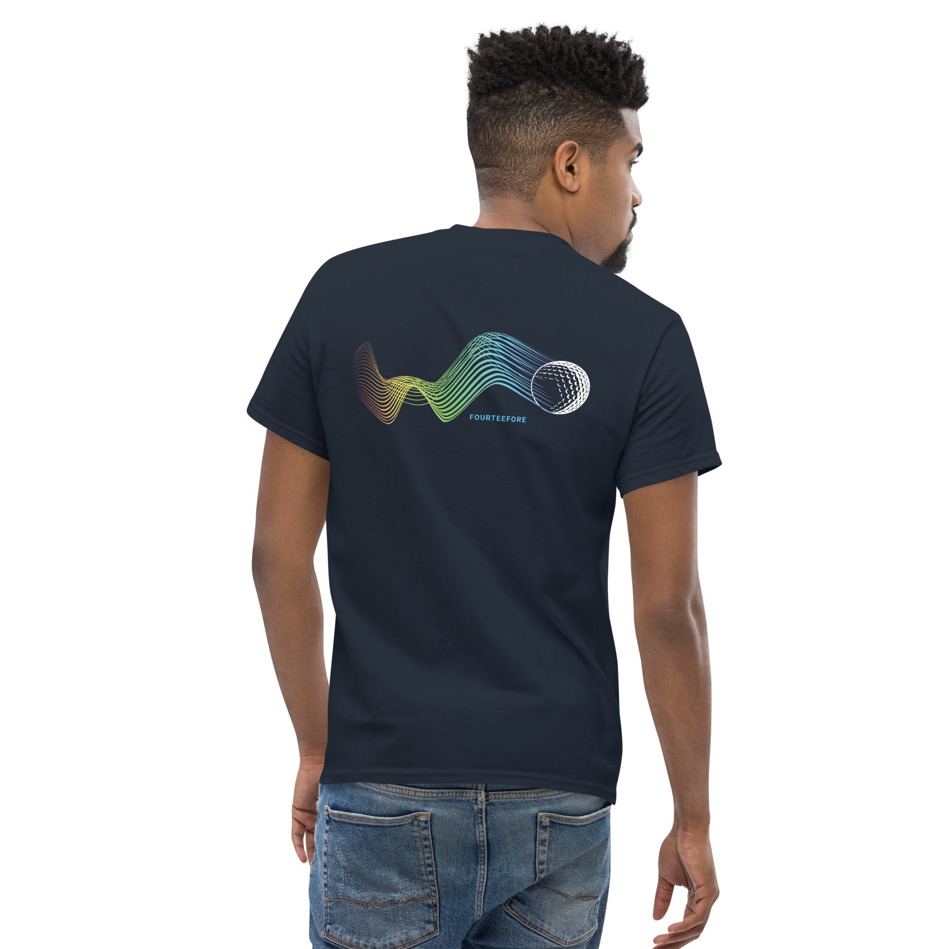 Male model waering a Navy blue bump n run Fourteefore casual golf t-shirt with a bold colorful graphic design of a golf ball as is bumps and runs.  small FTF logo embroidered on the left chest. Casual everyday golf streetwear by fourteefore