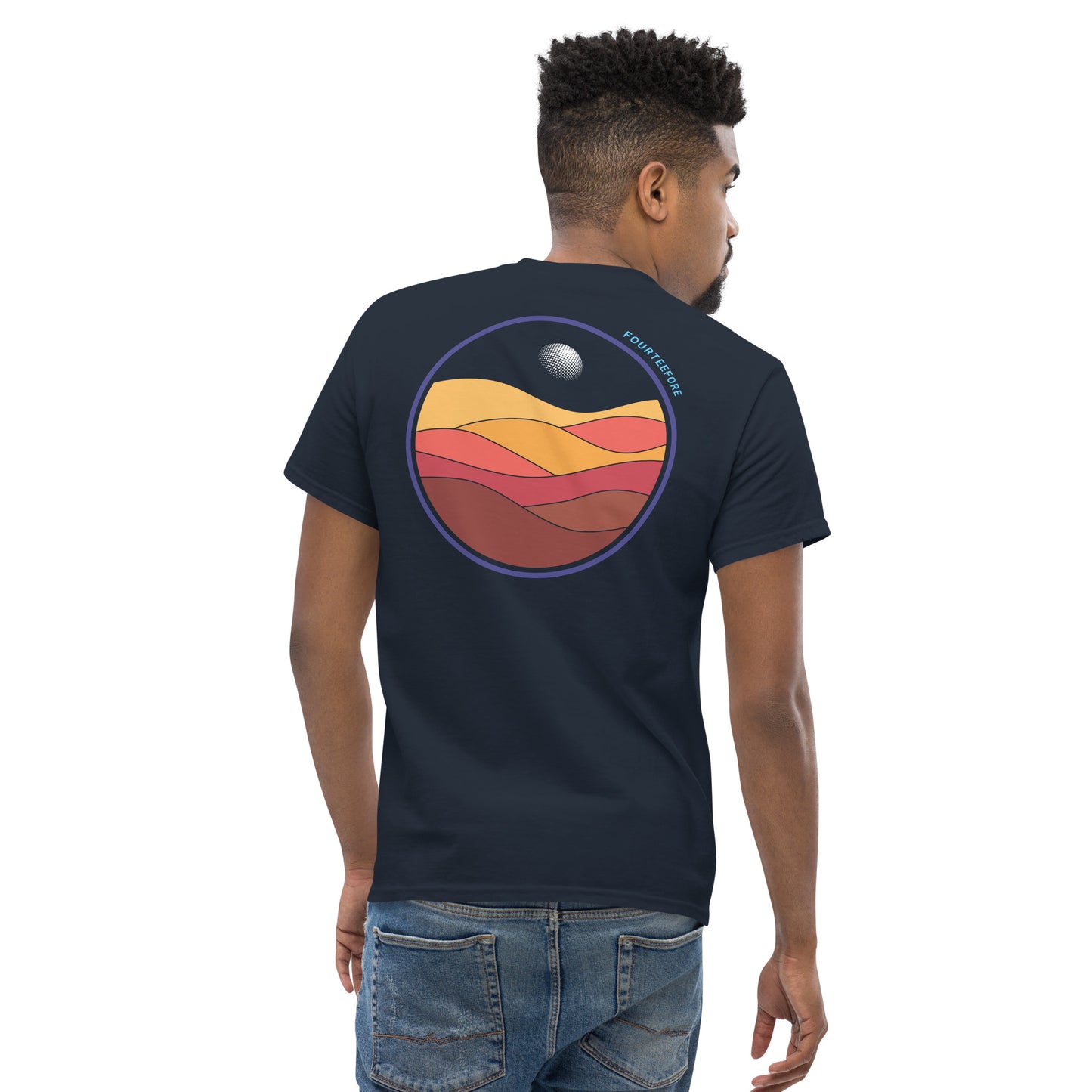 Male model wearing a Navy blue bunker bound Fourteefore casual golf t-shirt with a colorful bold graphic design on the back of dessert sand dunes and a golf ball moon. Small FTF embroidered logo on left chest. Casual everyday golf streetwear by fourteefore